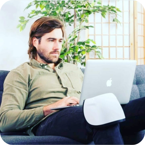 man working while knee massager